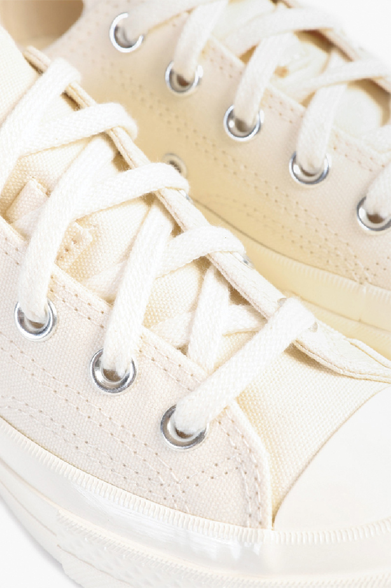 Converse x cdg basse blanche best sale